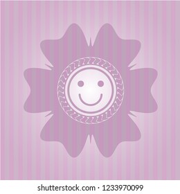 happy face icon inside badge with pink background