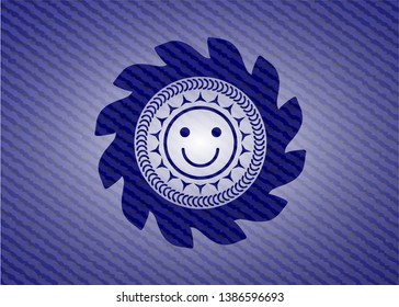 happy face icon inside badge with jean texture