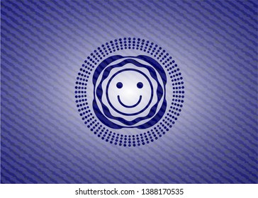 happy face icon inside badge with jean texture