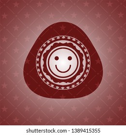 happy face icon inside badge with red background