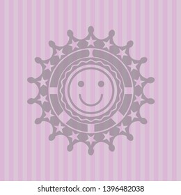 happy face icon inside badge with pink background