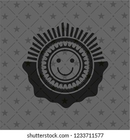 happy face icon inside black badge