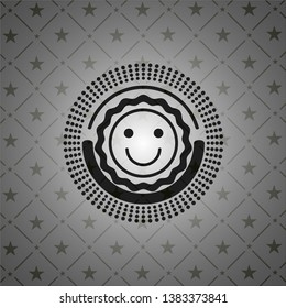 happy face icon inside black badge
