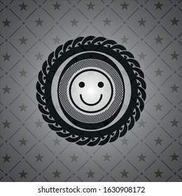 happy face icon inside black badge