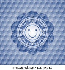 happy face icon inside blue emblem or badge with geometric pattern background.