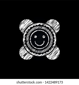 happy face icon inside chalk emblem written on a blackboard