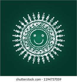 happy face icon inside chalkboard emblem