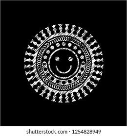 happy face icon inside chalkboard emblem