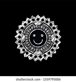 happy face icon inside chalkboard emblem on black board