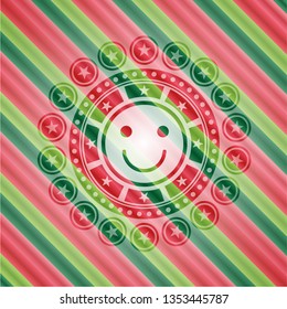 happy face icon inside christmas colors style badge.