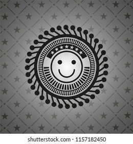 happy face icon inside dark badge or emblem
