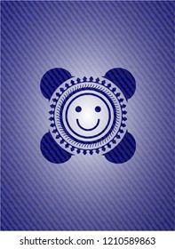 happy face icon inside denim background