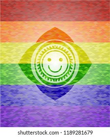 happy face icon inside emblem on mosaic background with the colors of the LGBT flag