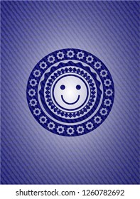 happy face icon inside emblem with jean texture
