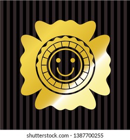 happy face icon inside golden emblem or badge