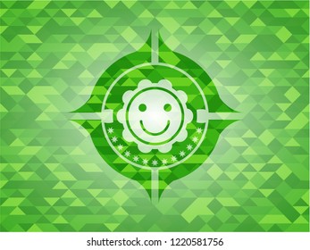 happy face icon inside green emblem with mosaic ecological style background