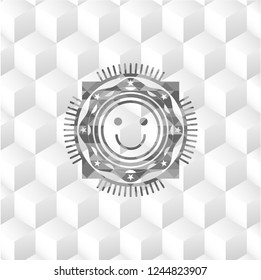 happy face icon inside grey badge with geometric cube white background