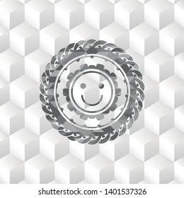 happy face icon inside grey badge with geometric cube white background