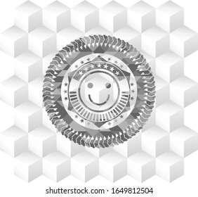 icono de la cara feliz dentro del emblema gris. Vintage con fondo blanco de cubo geométrico
