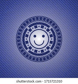 happy face icon inside jean background. 