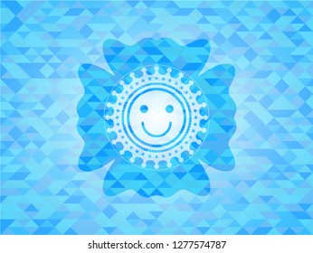 happy face icon inside light blue mosaic emblem