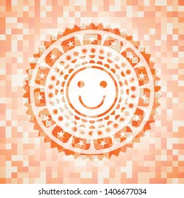 happy face icon inside orange mosaic emblem