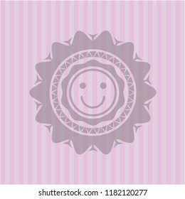 happy face icon inside pink emblem