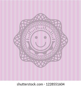 happy face icon inside pink icon or emblem