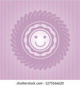 happy face icon inside pink emblem