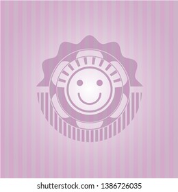 happy face icon inside pink icon or emblem