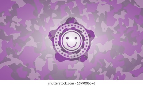 happy face icon inside pink and purple camo texture