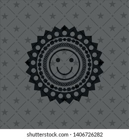 happy face icon inside realistic dark emblem