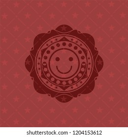 happy face icon inside red icon or emblem