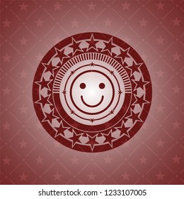 happy face icon inside red icon or emblem