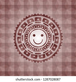 happy face icon inside red seamless polygonal badge.