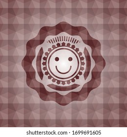 happy face icon inside red seamless emblem or badge with abstract geometric pattern background.