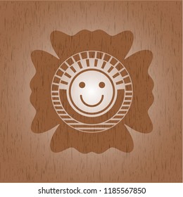 happy face icon inside retro style wood emblem