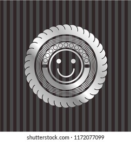 happy face icon inside silvery shiny badge