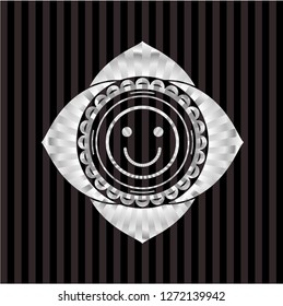 happy face icon inside silvery badge or emblem