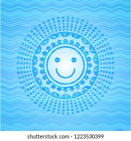 happy face icon inside water wave style badge.