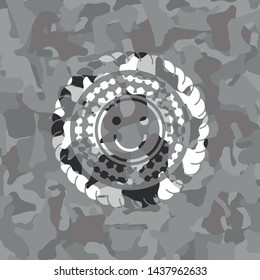 happy face icon on grey camouflage texture
