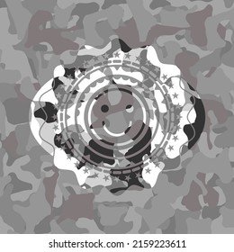 happy face icon on grey camo pattern. 