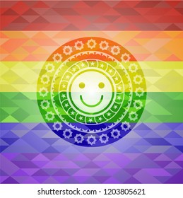 happy face icon on mosaic background with the colors of the LGBT flag