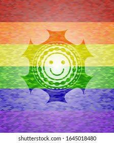 happy face icon on mosaic background with the colors of the LGBT flag