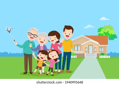 Happy family in the background of his home. Big family together in the park.happy elderly be happy on wheelchair with parents.