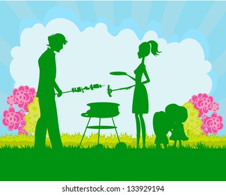 Happy family with barbecue