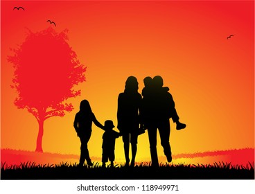 happy family and a beautiful sunset