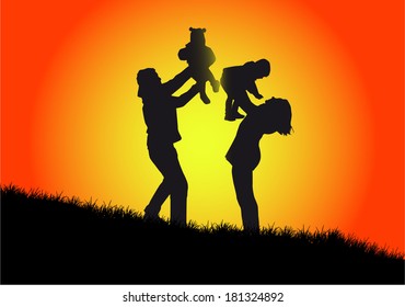 happy family and a beautiful sunset 