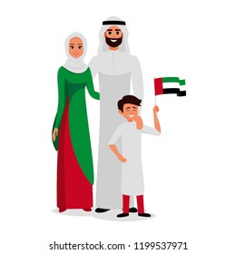 Happy family celebrating the UAE Independence Day. Smiling Father, mother and son holding the flag of UAE.