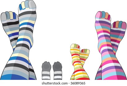 Happy family in color stripy socks - mom, dad, child and cat